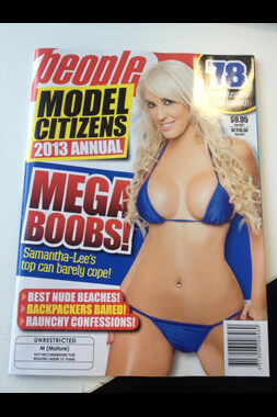 sydney female stripper wearing small blue bikini on front cover of magazine